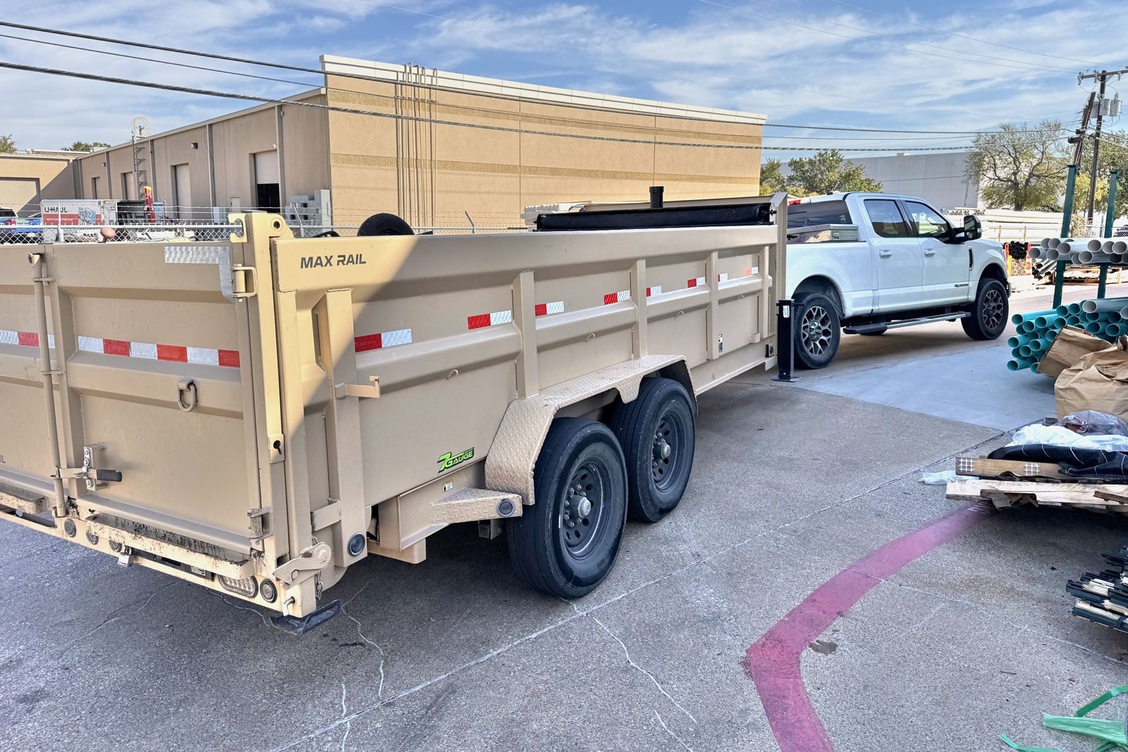 King Ridge truck and dump trailer at a pipe supply yard